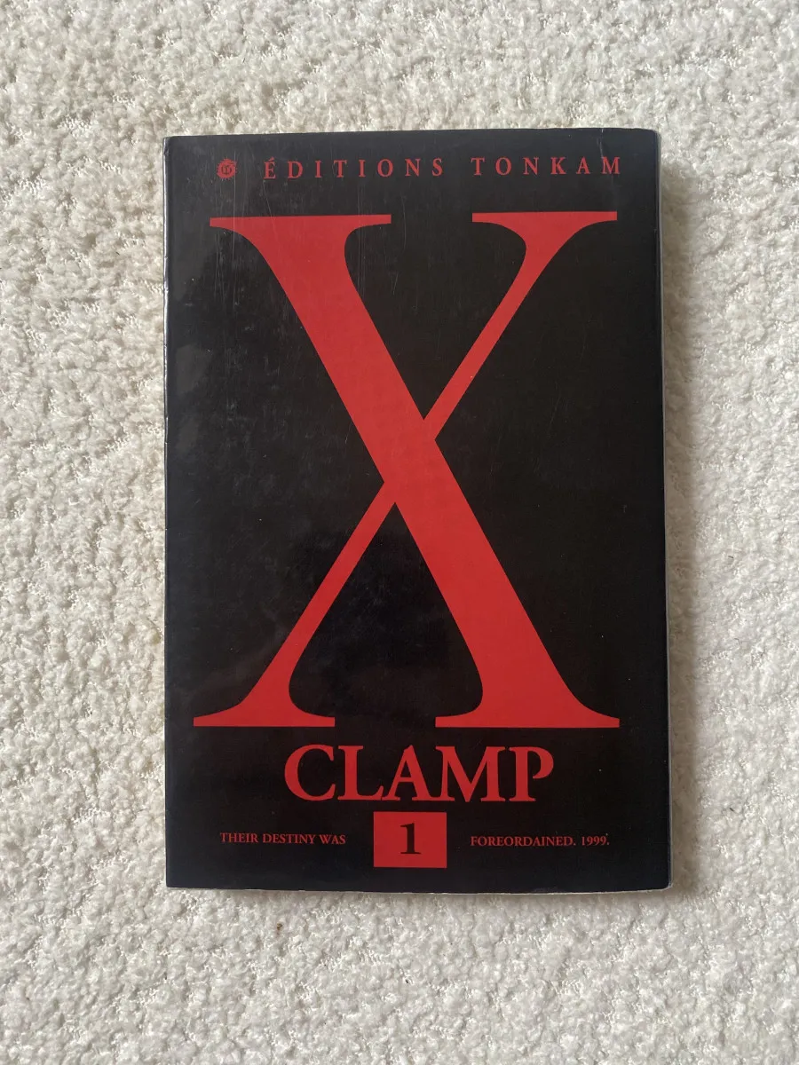 X Clamp tome 1