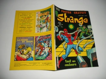 strange N° 122  avec poster attaché lug TBE