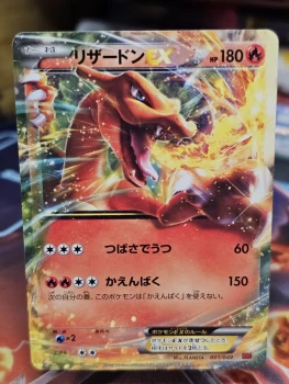 Charizard/Dracaufeu EX 001/049 carte pokémon