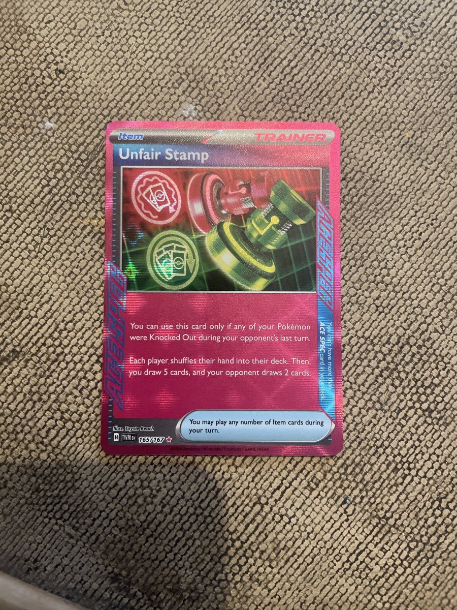 Carte Pokémon traîner anglaise Unfaire Stamp