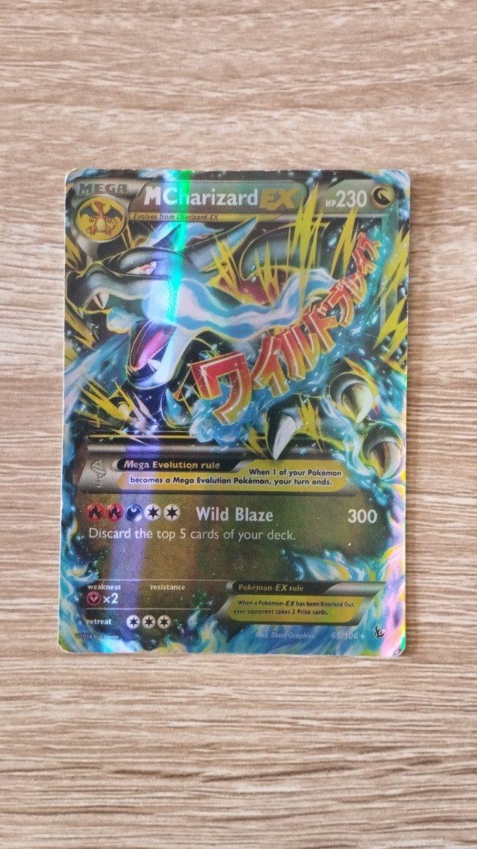 M Charizard EX 69