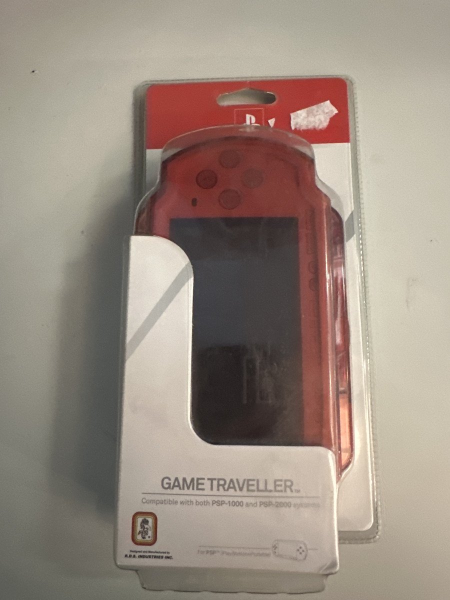Coque transparente rouge officiel psp 1000 2000 neuf blister