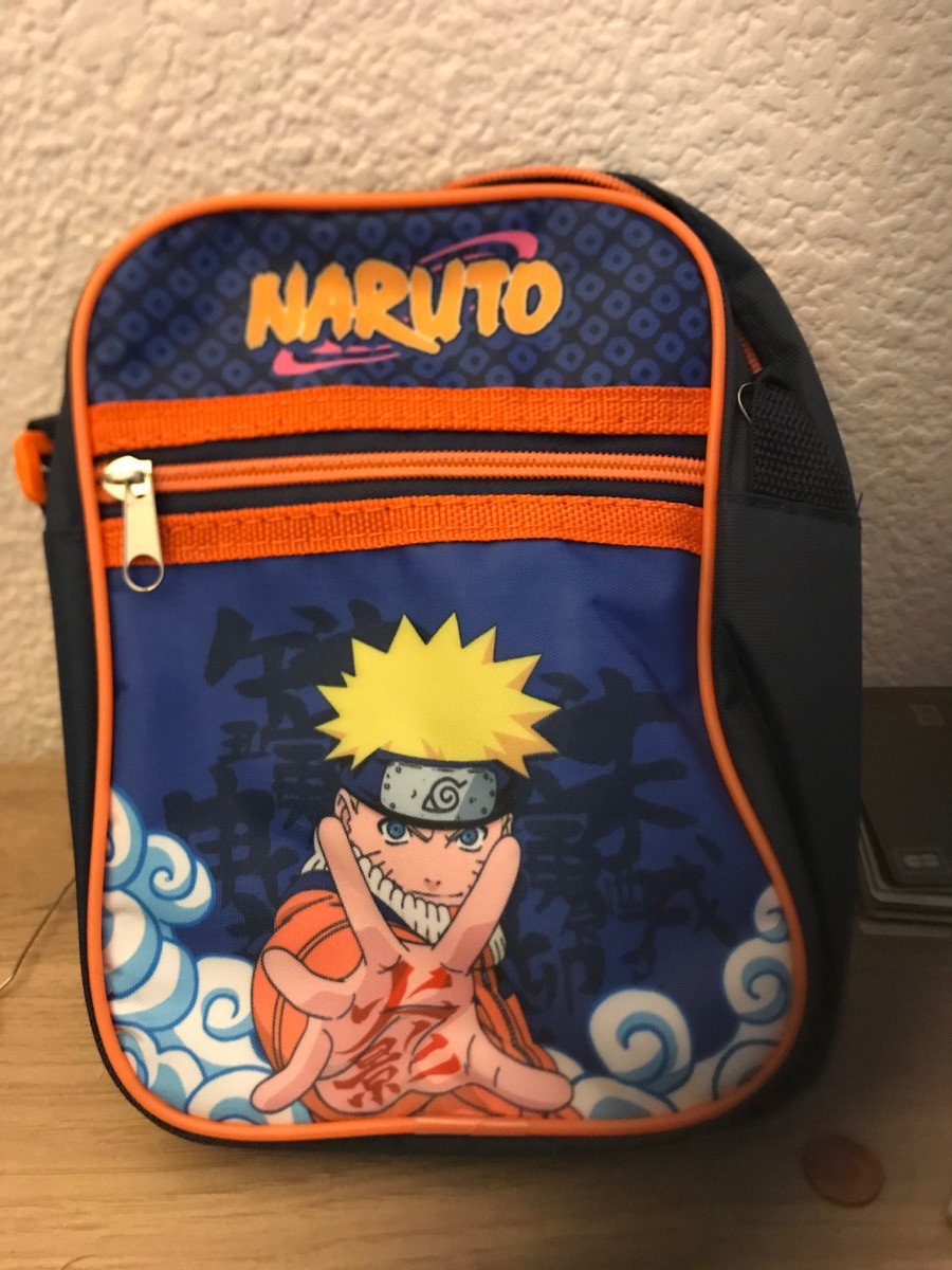 Sacoche bandoulière geek sous licence officielle, qui met à l'honneur le mythique manga Naruto Shippuden
