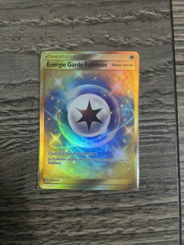 Carte Pokémon énergie garde faiblesse secrète
