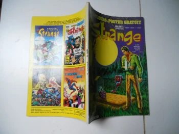 strange N° 150 avec poster attaché lug TBE